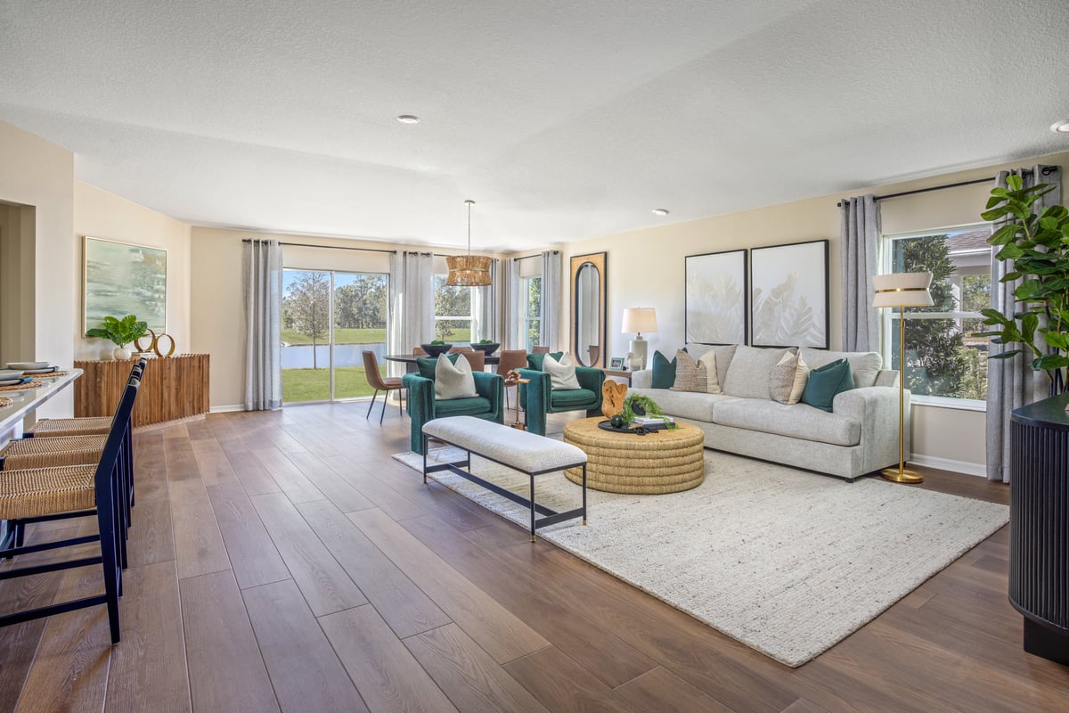 The furnished great room in Chapel Manor II’s Plan 1989 model home
